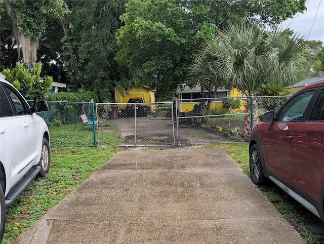 730 Citrus St, Orlando, FL 32805 - view of parking / parking lot with fence and a gate