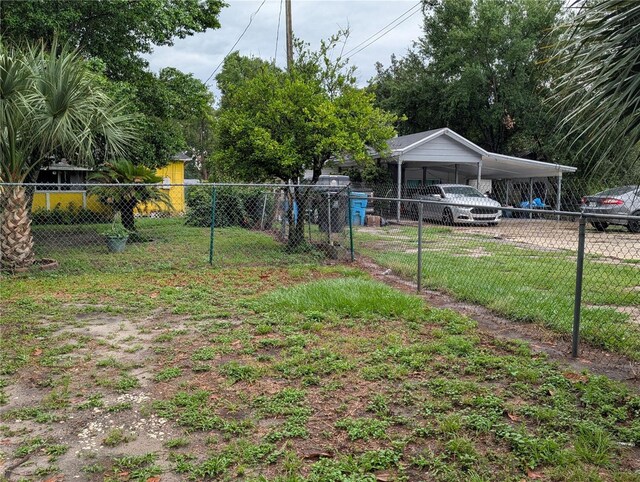 730 Citrus St, Orlando, FL 32805 - view of yard featuring a carport