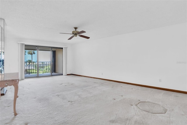4450 Gulf Blvd Unit 114, St Pete Beach, FL 33706 - spare room with carpet and ceiling fan