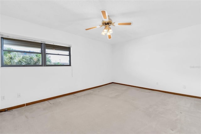 4450 Gulf Blvd Unit 114, St Pete Beach, FL 33706 - unfurnished room with light carpet and a ceiling fan
