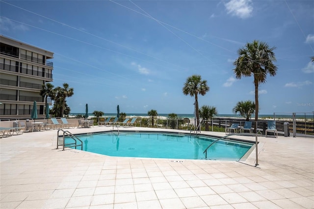 4450 Gulf Blvd Unit 114, St Pete Beach, FL 33706 - community pool featuring a patio