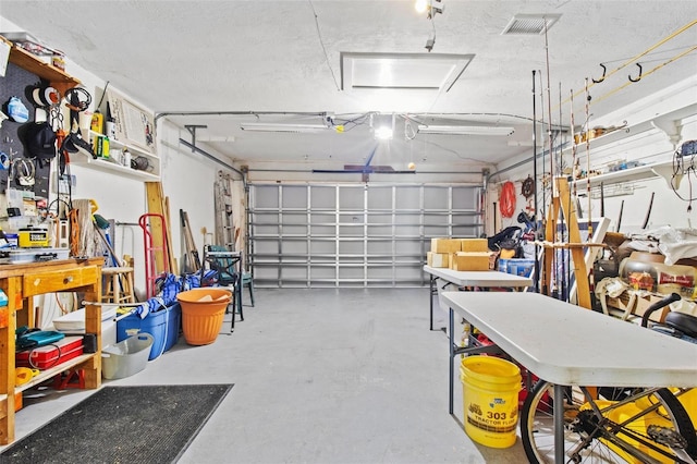 garage featuring a workshop area