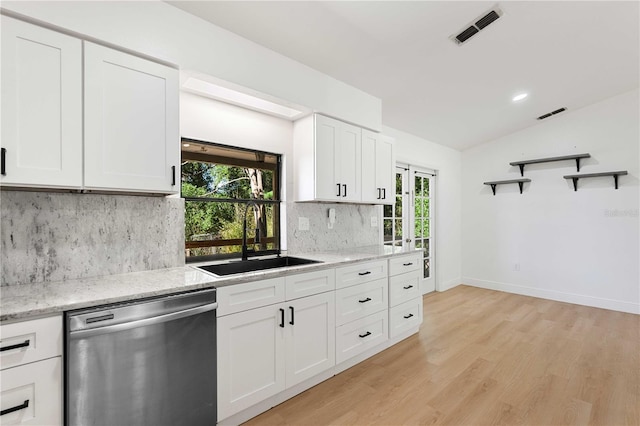 kitchen with open shelves, a sink, dishwasher, light wood-style flooring, and visible vents