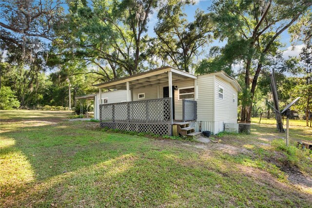 view of outdoor structure featuring a porch