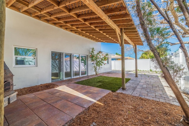 233 45th Ave, St Pete Beach, FL 33706 - fenced backyard featuring a patio