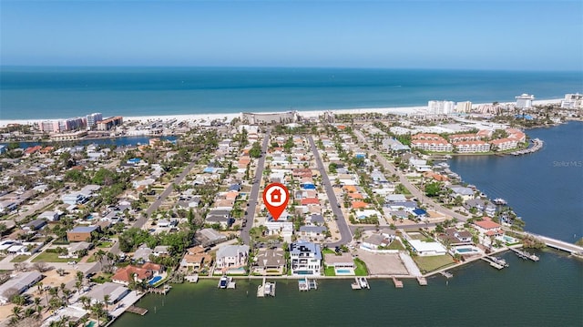 233 45th Ave, St Pete Beach, FL 33706 - aerial view of property and surrounding area with a large body of water and nearby urban area