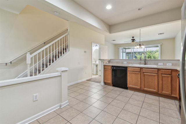 kitchen with a sink, visible vents, black dishwasher, brown cabinets, and light tile patterned floors