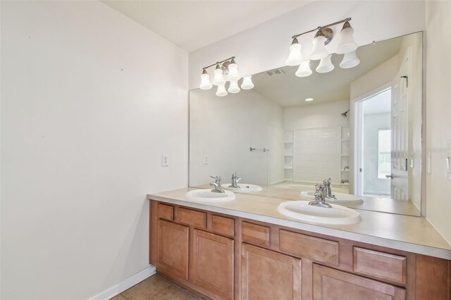 full bath with tile patterned flooring, a sink, a shower, and double vanity