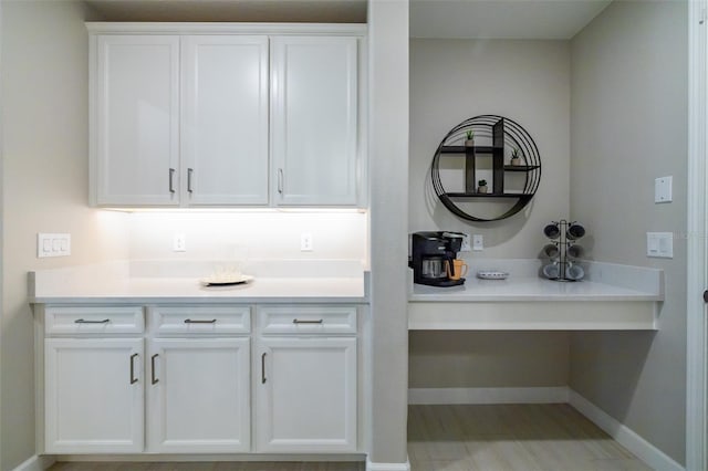 bar featuring baseboards