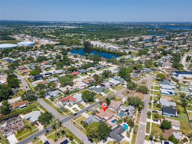 aerial view featuring a residential view and a water view