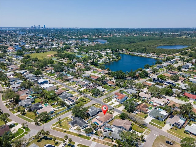 bird's eye view with a water view and a residential view