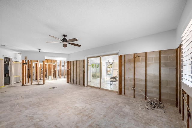 unfurnished room with ceiling fan and visible vents