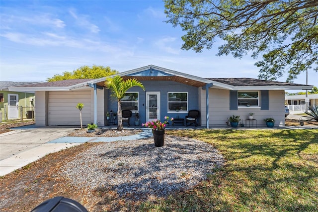 1344 Dartmouth Dr, Holiday, FL 34691 - ranch-style house with a porch and a front yard
