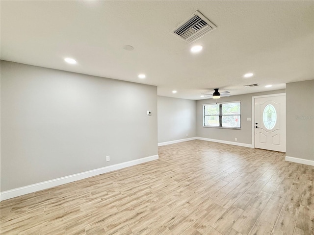 8648 78th Pl, Seminole, FL 33777 - entrance foyer with recessed lighting, light wood finished floors, baseboards, and a ceiling fan