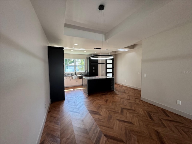 7208 N Glen Ave, Tampa, FL 33614 - corridor with recessed lighting, baseboards, and a sink
