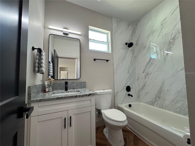 7208 N Glen Ave, Tampa, FL 33614 - bathroom featuring shower / washtub combination, toilet, vanity, and wood finished floors