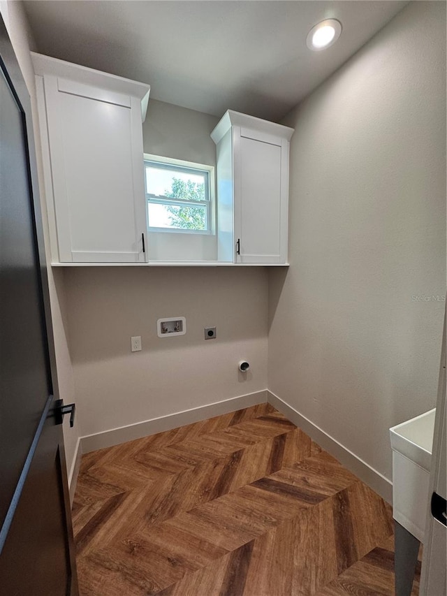 7208 N Glen Ave, Tampa, FL 33614 - laundry area featuring recessed lighting, baseboards, electric dryer hookup, cabinet space, and washer hookup