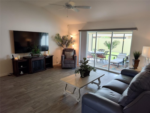 6030 Dijulio Ter, The Villages, FL 32163 - living area featuring vaulted ceiling, wood finished floors, baseboards, and ceiling fan
