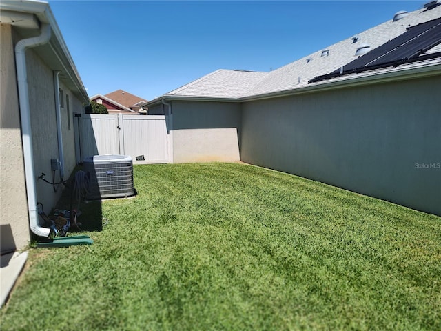 6030 Dijulio Ter, The Villages, FL 32163 - view of yard with cooling unit, fence, and a gate