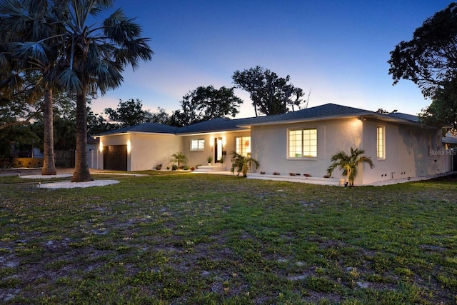 420 48th St N, Saint Petersburg, FL 33713 - single story home featuring an attached garage, a front yard, and stucco siding