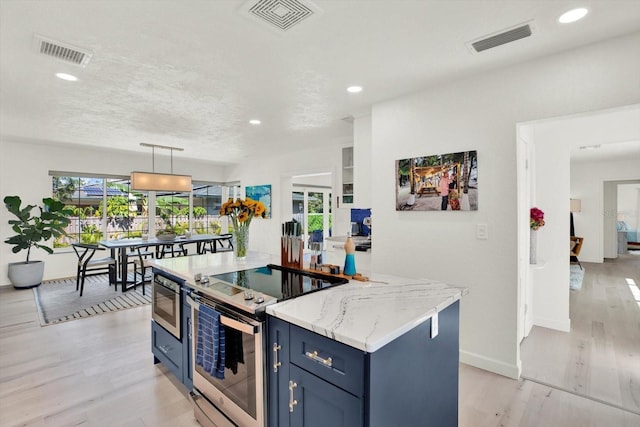 420 48th St N, Saint Petersburg, FL 33713 - kitchen featuring blue cabinetry, electric stove, and visible vents