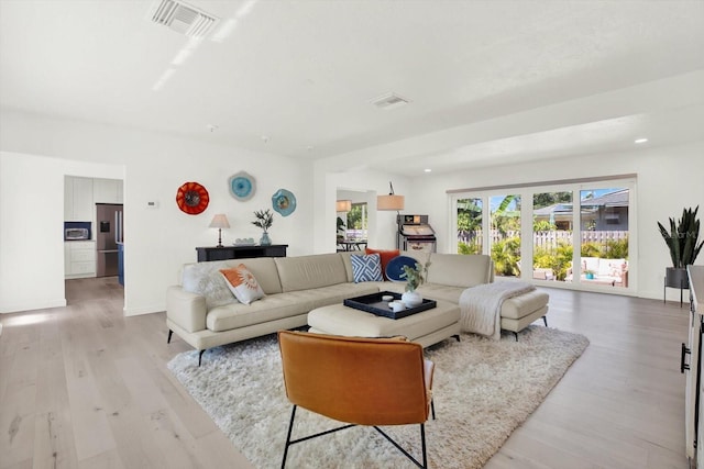 420 48th St N, Saint Petersburg, FL 33713 - living area featuring light wood finished floors, visible vents, and recessed lighting
