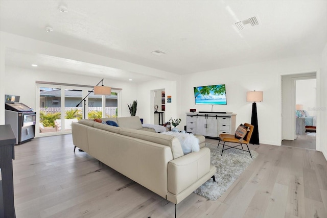 420 48th St N, Saint Petersburg, FL 33713 - living area with light wood-style flooring and visible vents