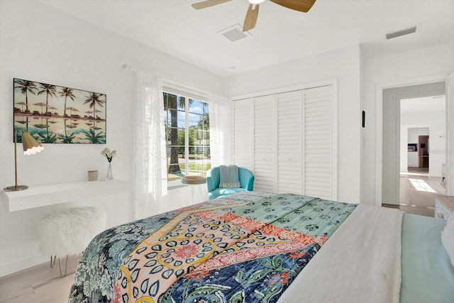 420 48th St N, Saint Petersburg, FL 33713 - bedroom with a ceiling fan, visible vents, and a closet
