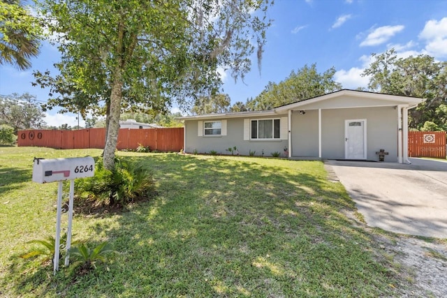 single story home featuring stucco siding, a front lawn, and fence