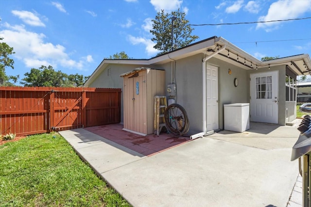 exterior space with a gate and fence