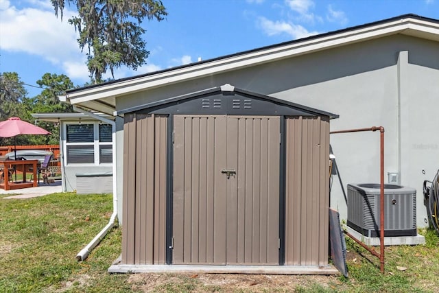 view of shed featuring central air condition unit