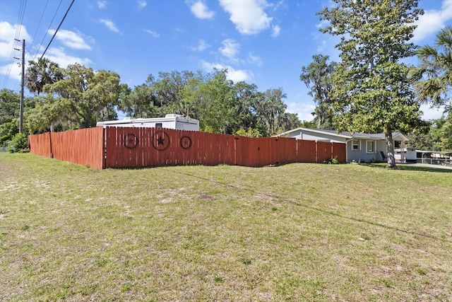 view of yard featuring fence