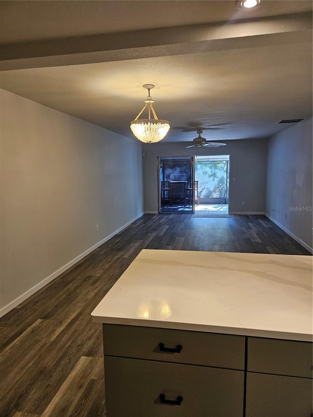 414 Danube Ave, Tampa, FL 33606 - unfurnished dining area featuring baseboards, ceiling fan, and dark wood-style floors