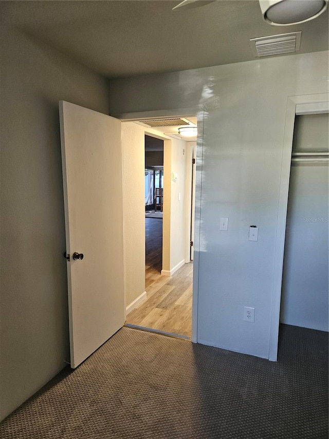 414 Danube Ave, Tampa, FL 33606 - interior space featuring a closet, visible vents, and wood finished floors