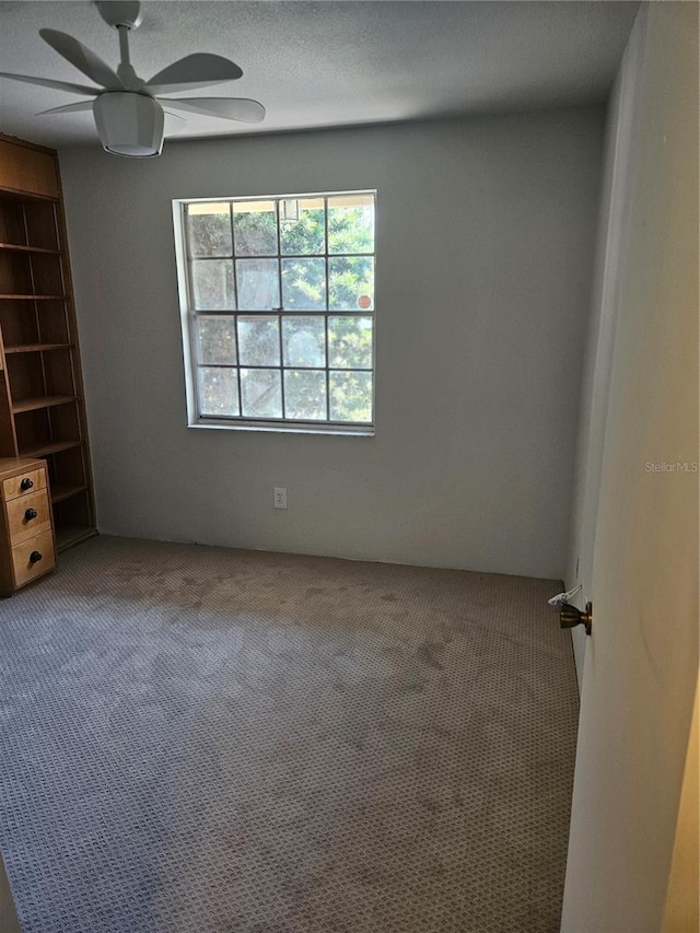 414 Danube Ave, Tampa, FL 33606 - carpeted spare room featuring a ceiling fan
