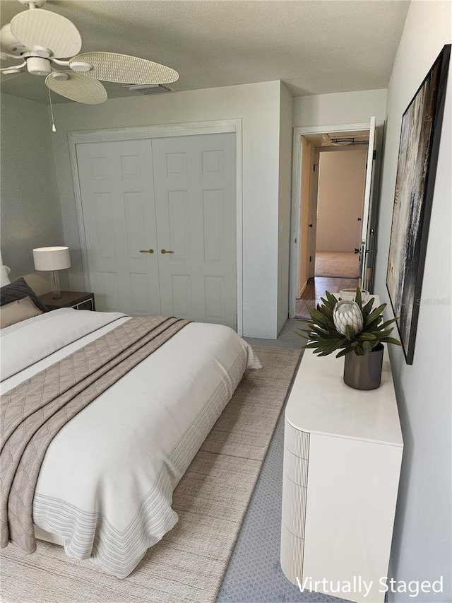 414 Danube Ave, Tampa, FL 33606 - carpeted bedroom with a closet and ceiling fan