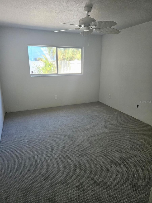 414 Danube Ave, Tampa, FL 33606 - spare room featuring a textured ceiling, a ceiling fan, and carpet floors