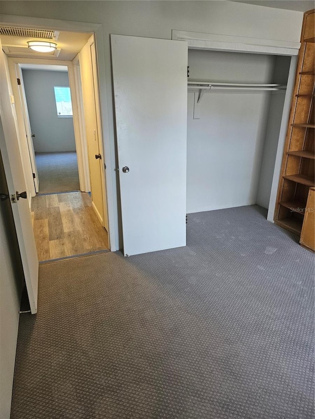 414 Danube Ave, Tampa, FL 33606 - unfurnished bedroom with a closet, visible vents, and carpet floors