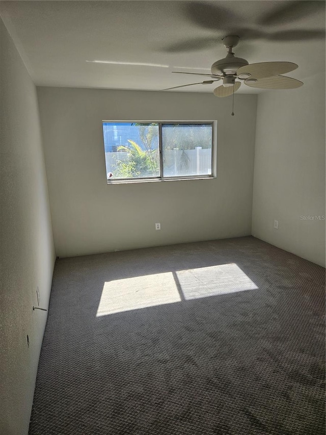 414 Danube Ave, Tampa, FL 33606 - carpeted empty room with ceiling fan
