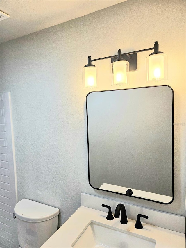 414 Danube Ave, Tampa, FL 33606 - bathroom with toilet and vanity