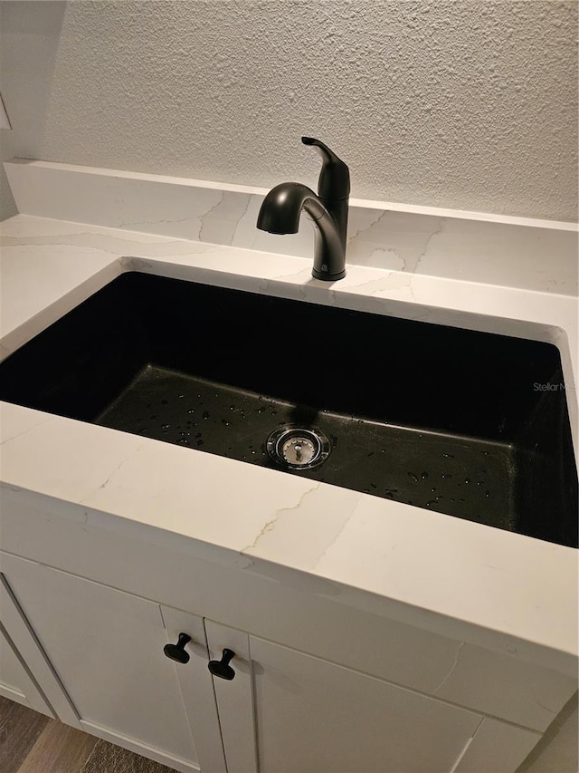 414 Danube Ave, Tampa, FL 33606 - room details featuring light stone countertops and a sink