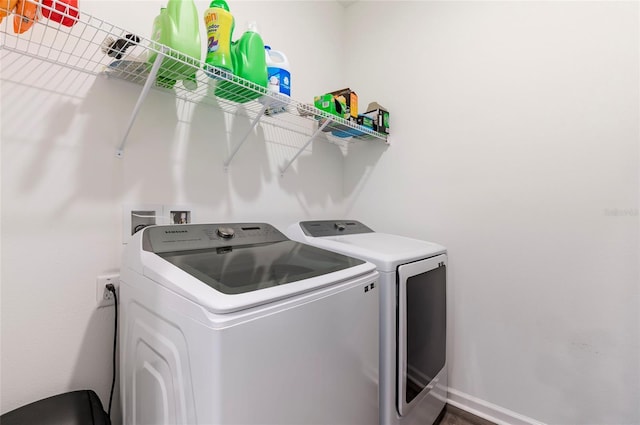laundry area featuring independent washer and dryer and laundry area