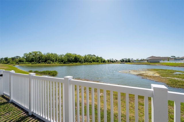 water view featuring fence