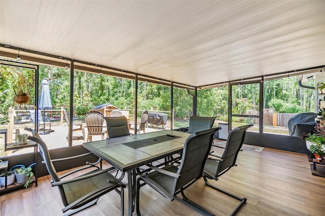 6821 Mary Lou Ln, Wesley Chapel, FL 33544 - sunroom featuring a healthy amount of sunlight and outdoor dining area
