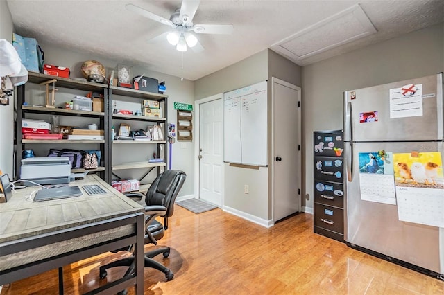 6821 Mary Lou Ln, Wesley Chapel, FL 33544 - office area with a ceiling fan, baseboards, attic access, and light wood-style floors