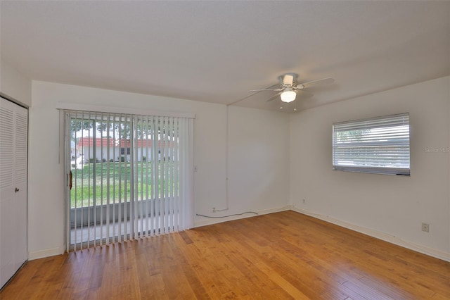 1802 Bedford Ter Unit 187, Sun City Center, FL 33573 - unfurnished room with a ceiling fan, light wood-style floors, and baseboards