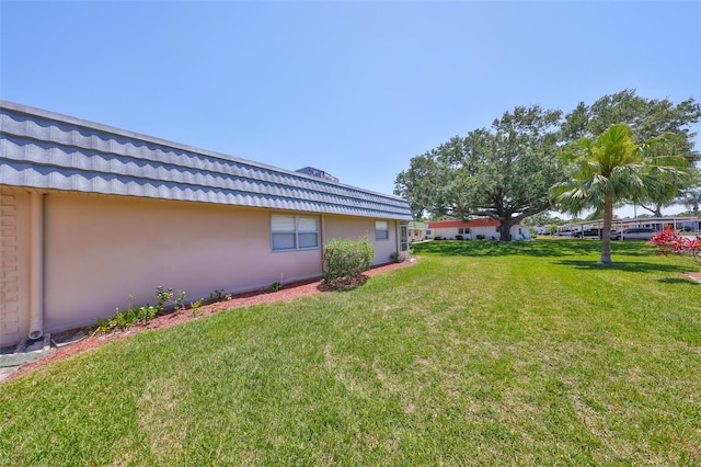 1802 Bedford Ter Unit 187, Sun City Center, FL 33573 - view of grassy yard