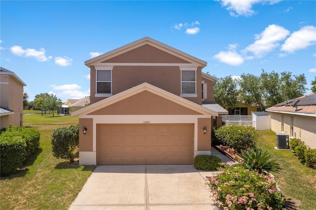 11449 Crestlake Village Dr, Riverview, FL 33569 - traditional-style house featuring stucco siding, a garage, concrete driveway, and a front yard