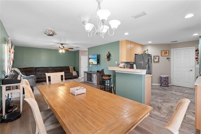 11449 Crestlake Village Dr, Riverview, FL 33569 - dining space featuring ceiling fan with notable chandelier, baseboards, visible vents, and recessed lighting