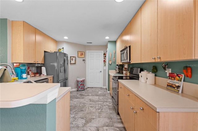 11449 Crestlake Village Dr, Riverview, FL 33569 - kitchen featuring stainless steel appliances, a sink, baseboards, recessed lighting, and light countertops